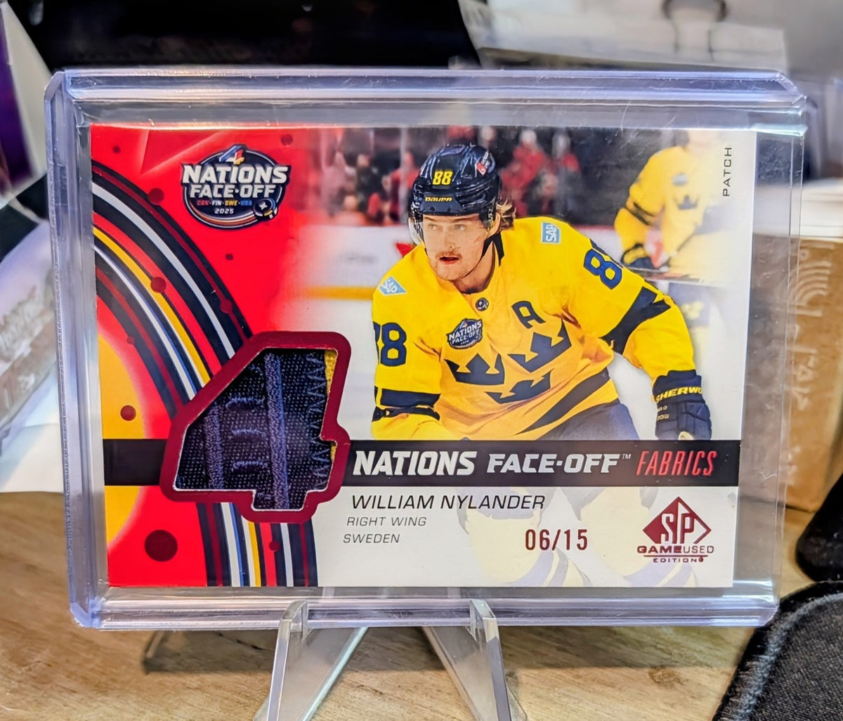 Upper Deck 2025-26 SP Game Used Nations Face-Off Fabrics William Nylander #06/15